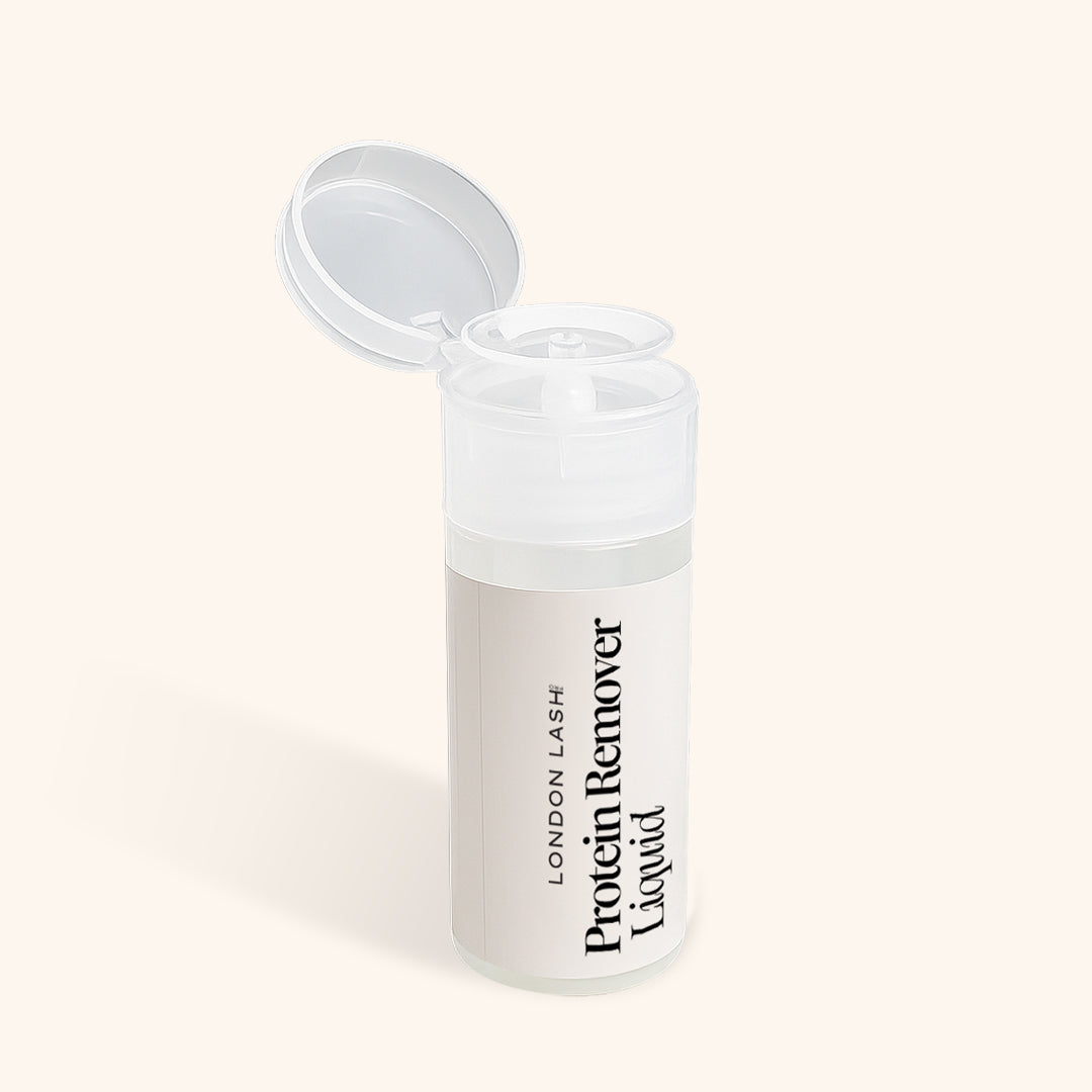 Clear container with 'London Lash Protein Remover Liquid' text on a beige background